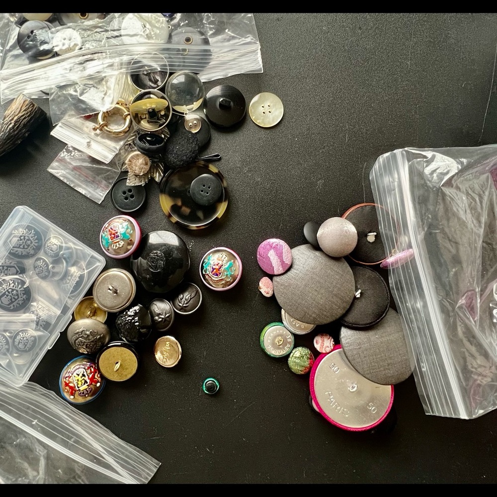 Buttons over 75 buttons some designer ones too. Armani and Versace